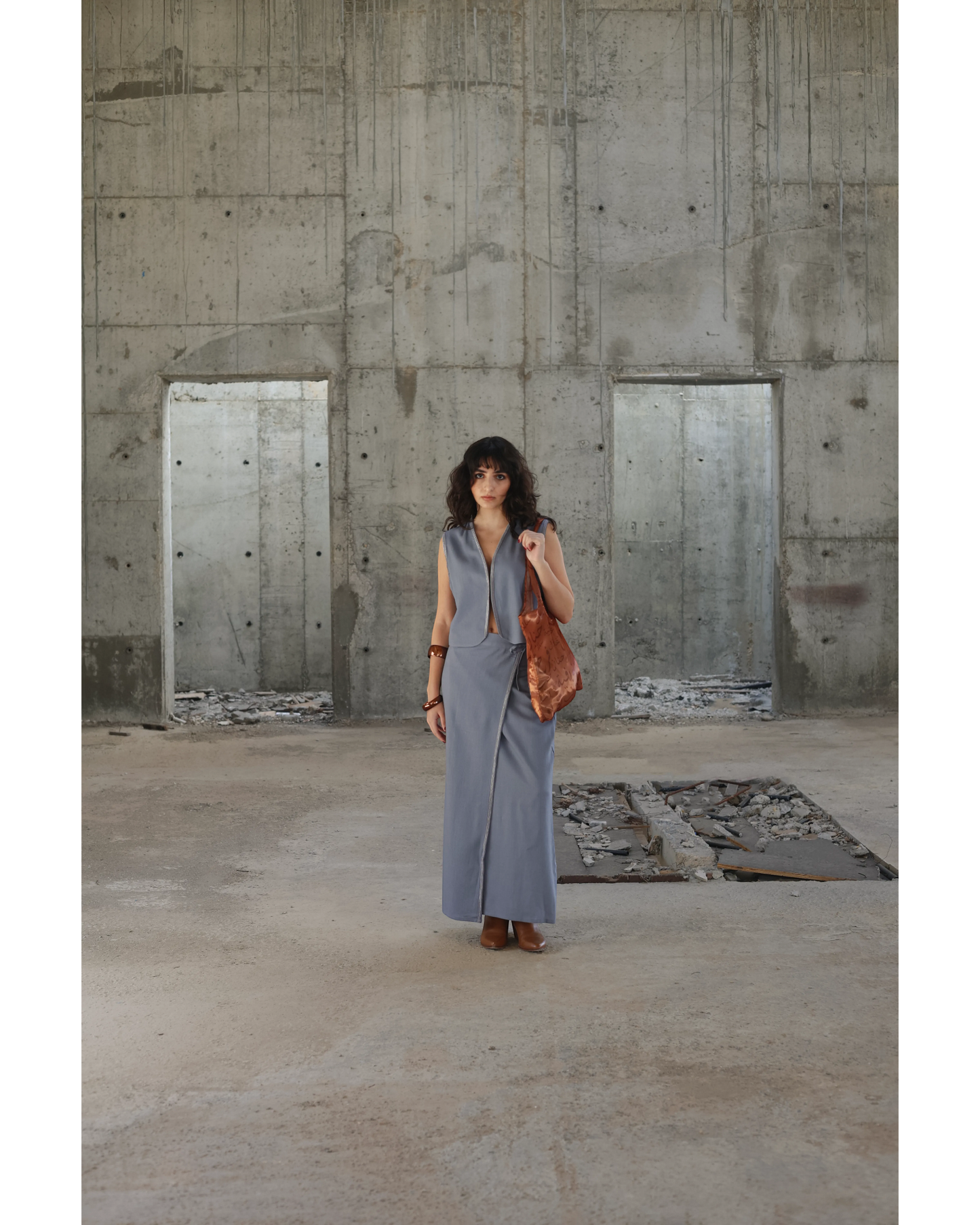 Farah Daylac dusty blue-grey linen maxi wrap skirt with front hip tie and tonal embroidery.