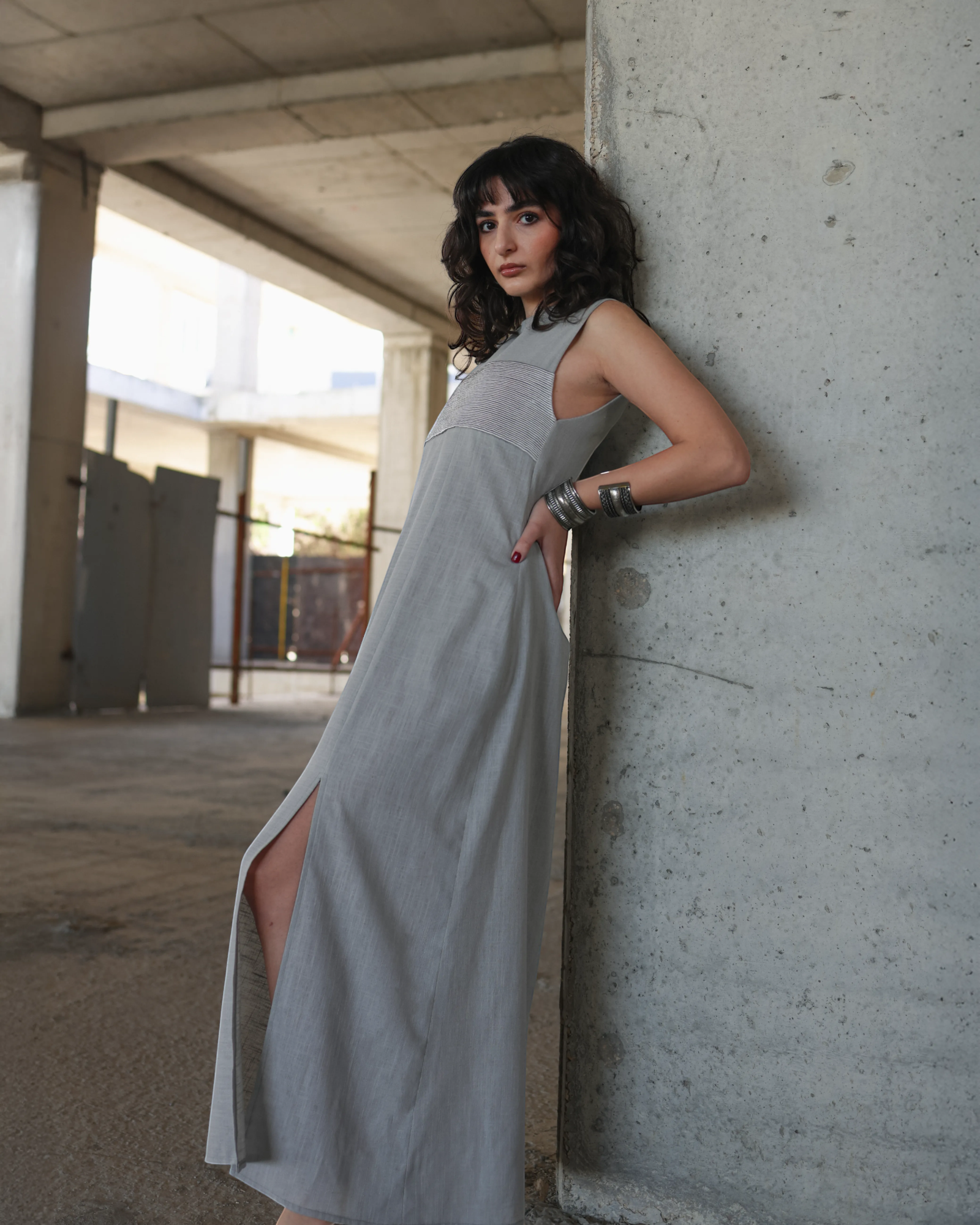 Farah Daylac dove grey linen maxi dress with front slit and textured embroidery across the chest.