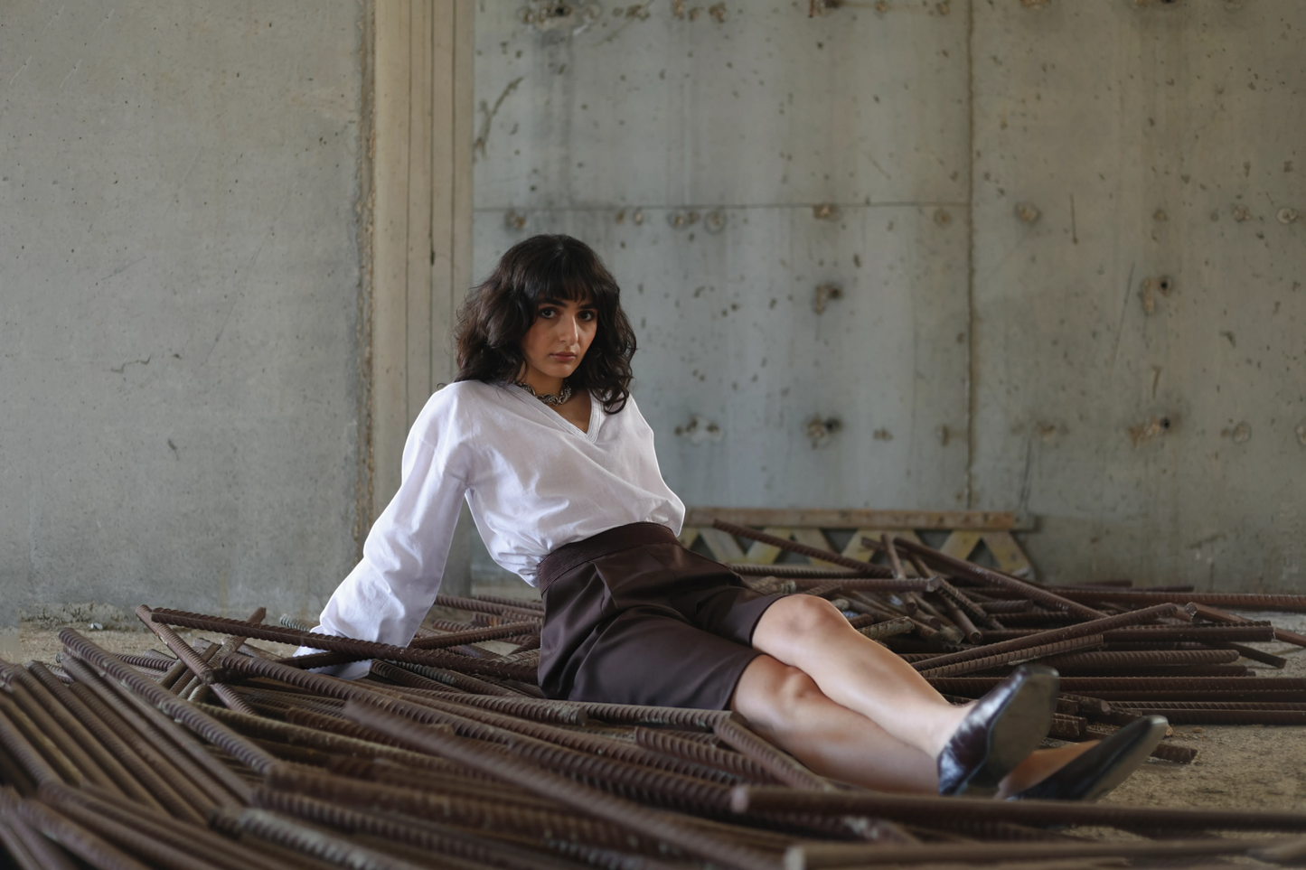 Farah Daylac deep chocolate brown wide-leg shorts with embroidered waistband and side pockets.